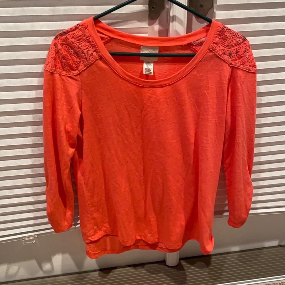 Long sleeve peach color shirt with lacy design on shoulders